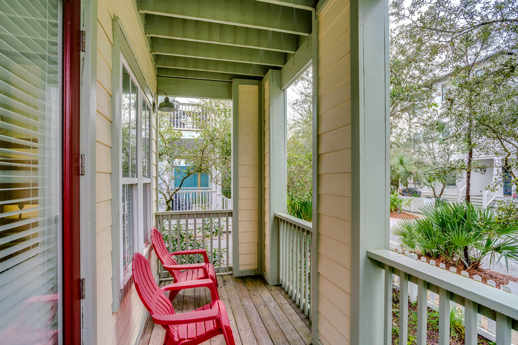 96 Chelsea Loop Road Santa Rosa Beach, FL 32459 - Photo 21 of 26 a balcony with furniture and wooden floor