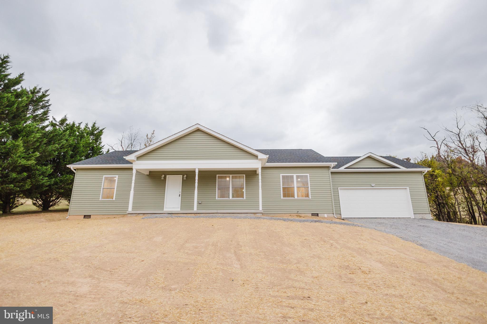 front view of house with a yard
