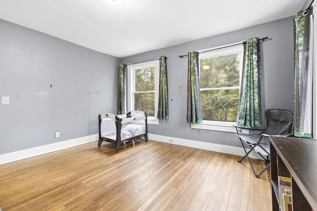 17 Wellesley Street Weston, MA 02493 - Photo 13 of 30 a living room with furniture and a window