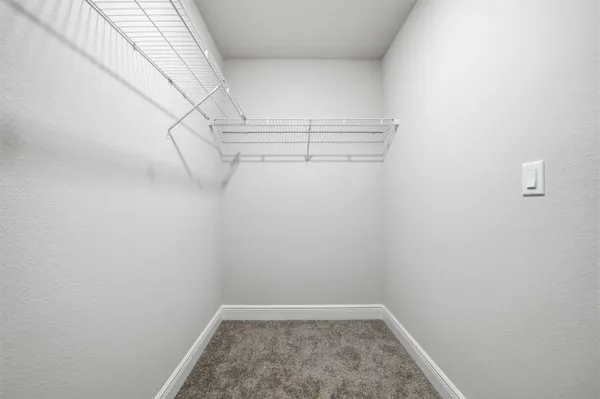 a view of a room with racks on the wall