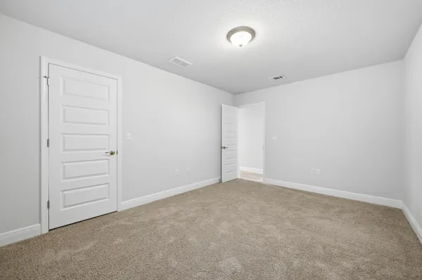 an empty room with closet