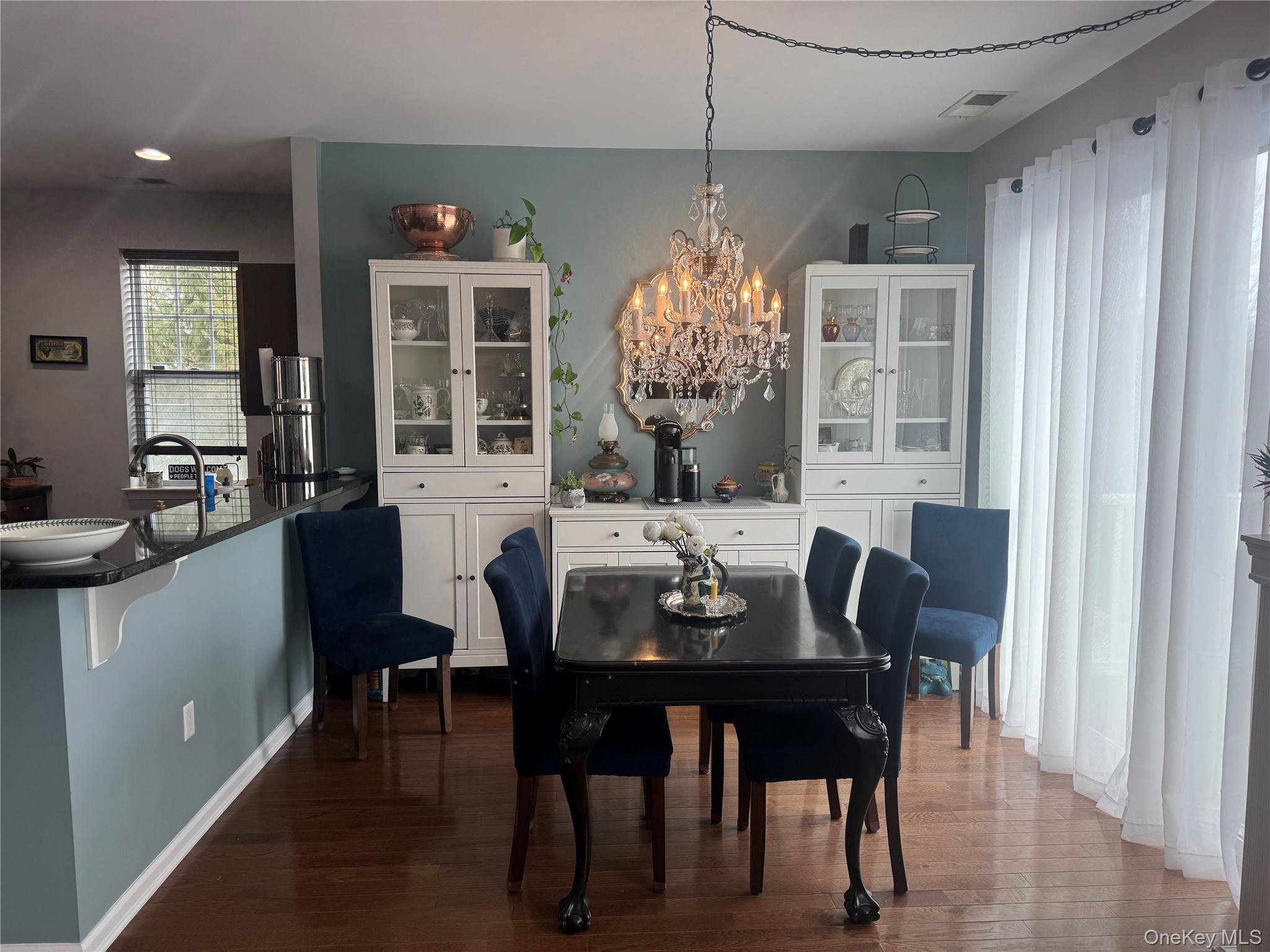 21 High Ridge Lane, Unit 21 Middletown, NY 10940 - Photo 11 of 33 a view of a dining room with furniture window and outside view
