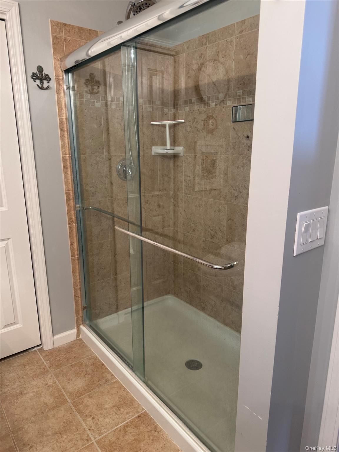 21 High Ridge Lane, Unit 21 Middletown, NY 10940 - Photo 17 of 33 a bathroom with a shower