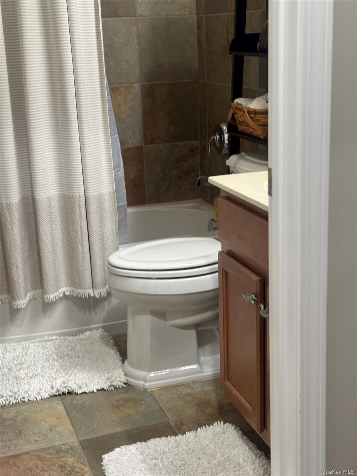 21 High Ridge Lane, Unit 21 Middletown, NY 10940 - Photo 19 of 33 a bathroom with a toilet and a shower