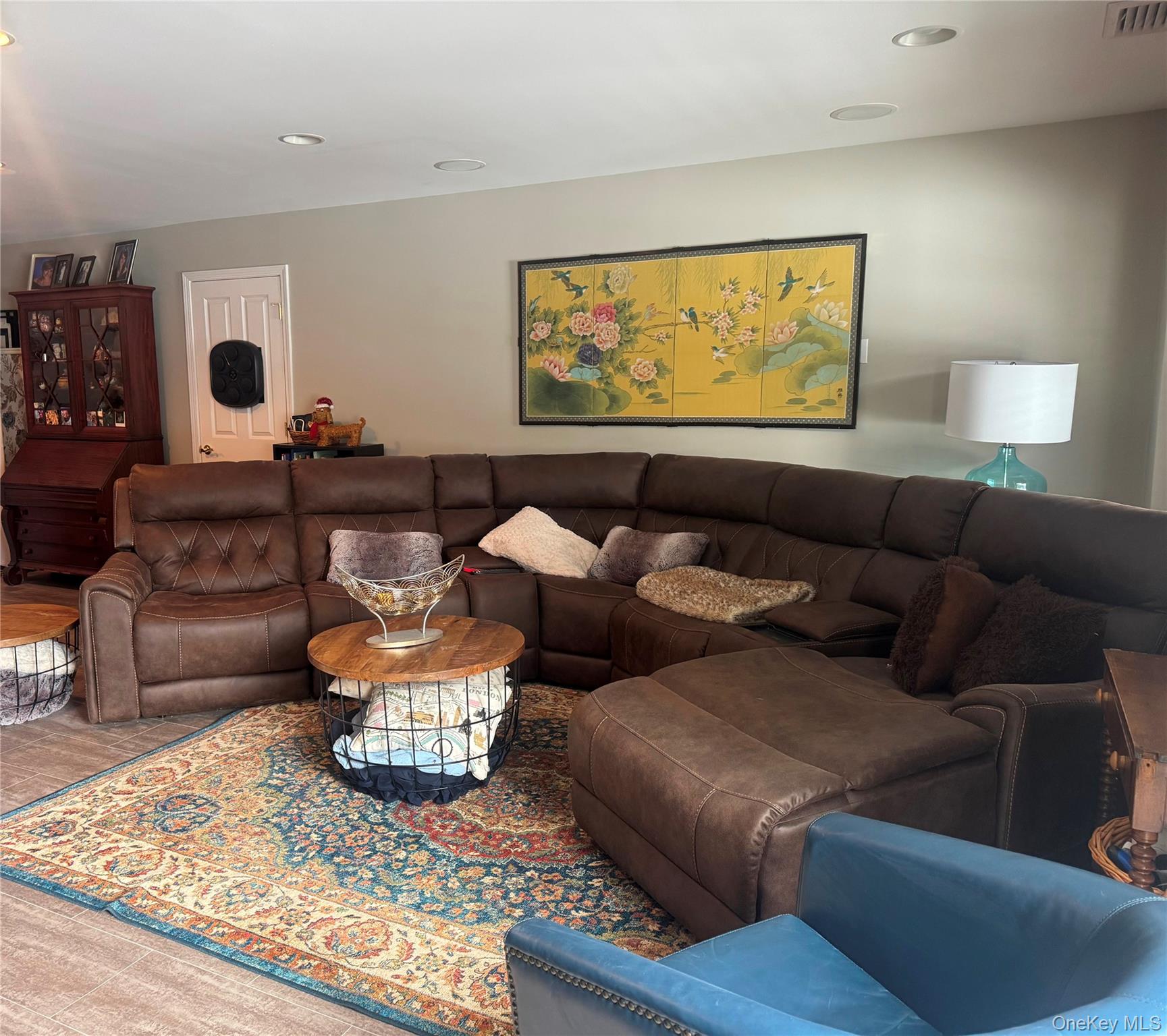 21 High Ridge Lane, Unit 21 Middletown, NY 10940 - Photo 20 of 33 a living room with furniture and a rug