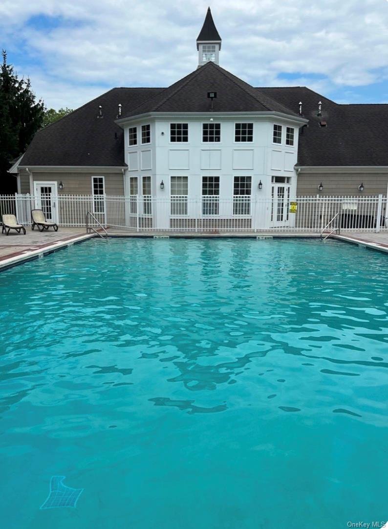 21 High Ridge Lane, Unit 21 Middletown, NY 10940 - Photo 24 of 33 front view of a house with a yard