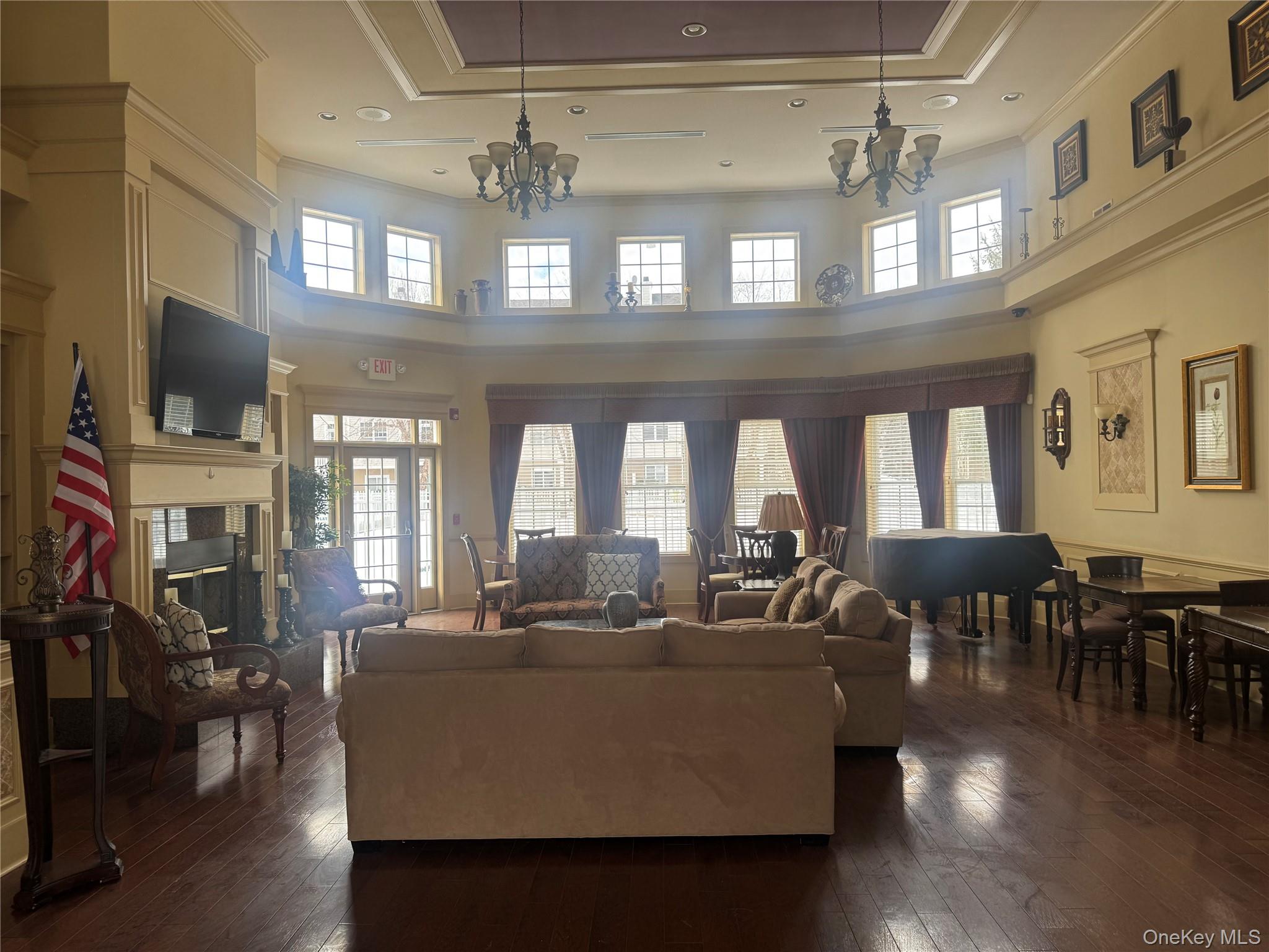 21 High Ridge Lane, Unit 21 Middletown, NY 10940 - Photo 25 of 33 a living room with lots of furniture and a flat screen tv