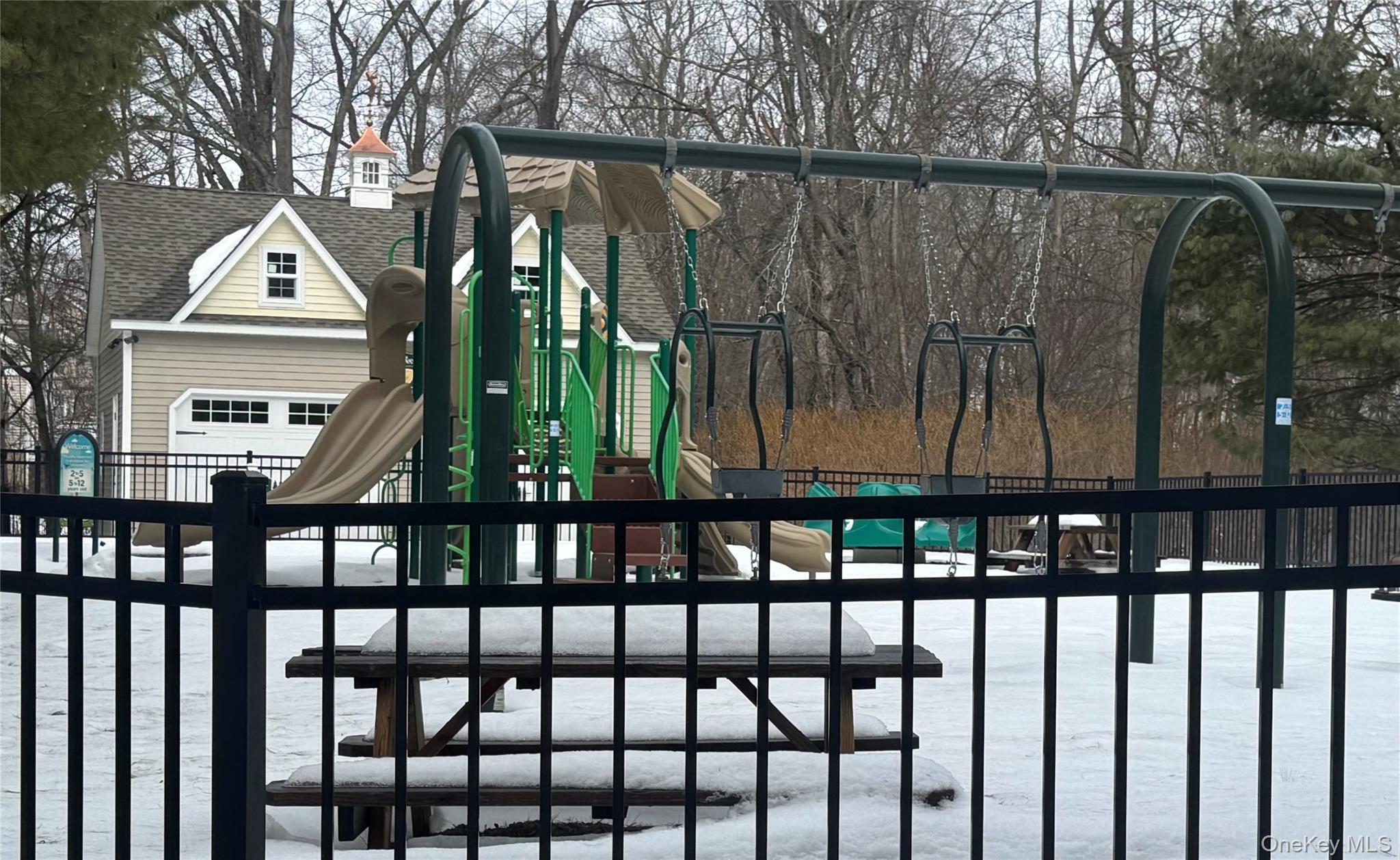 21 High Ridge Lane, Unit 21 Middletown, NY 10940 - Photo 32 of 33 a view of wooden fence and a yard