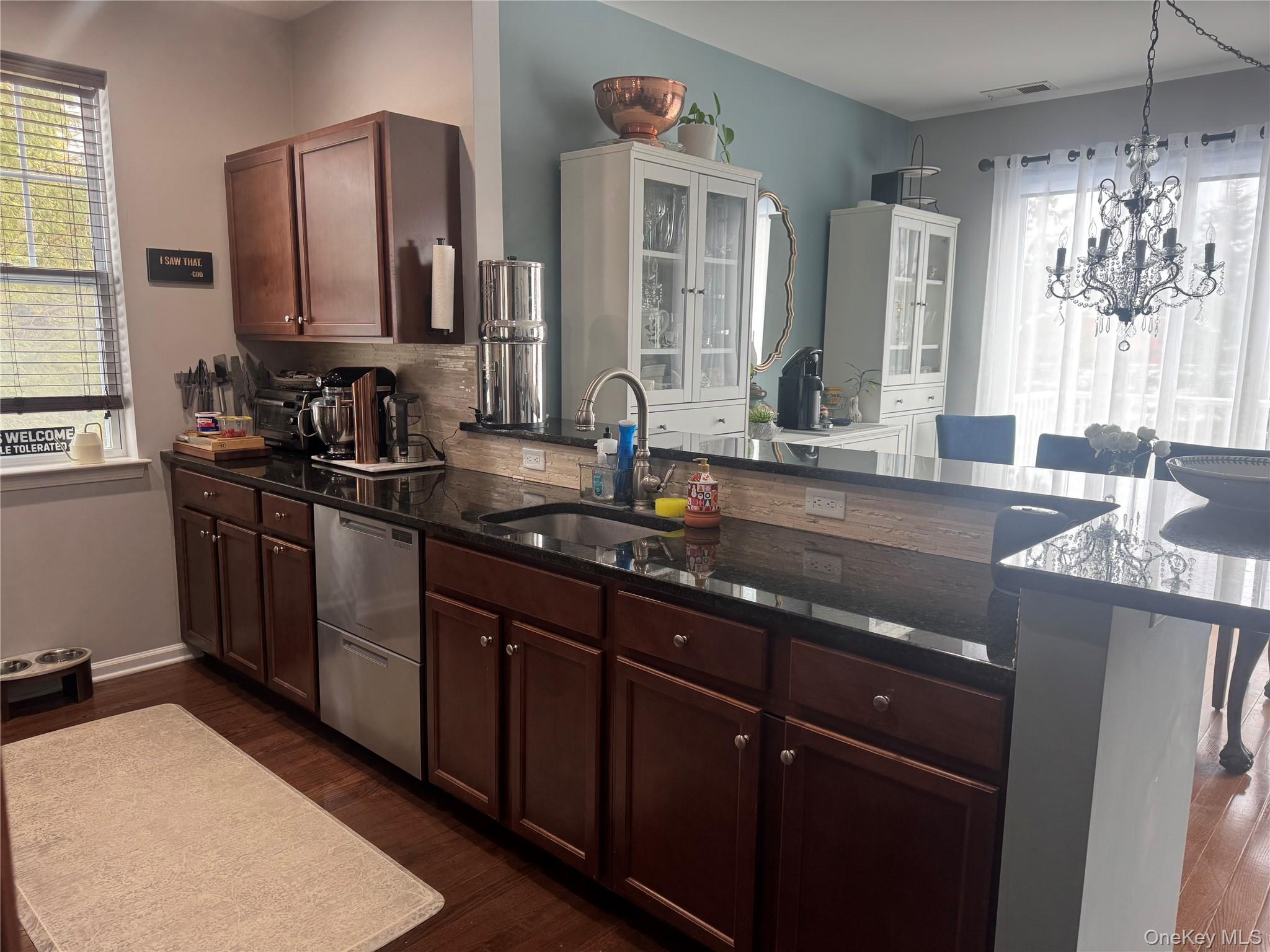 21 High Ridge Lane, Unit 21 Middletown, NY 10940 - Photo 10 of 33 a kitchen with stainless steel appliances granite countertop a sink stove and cabinets