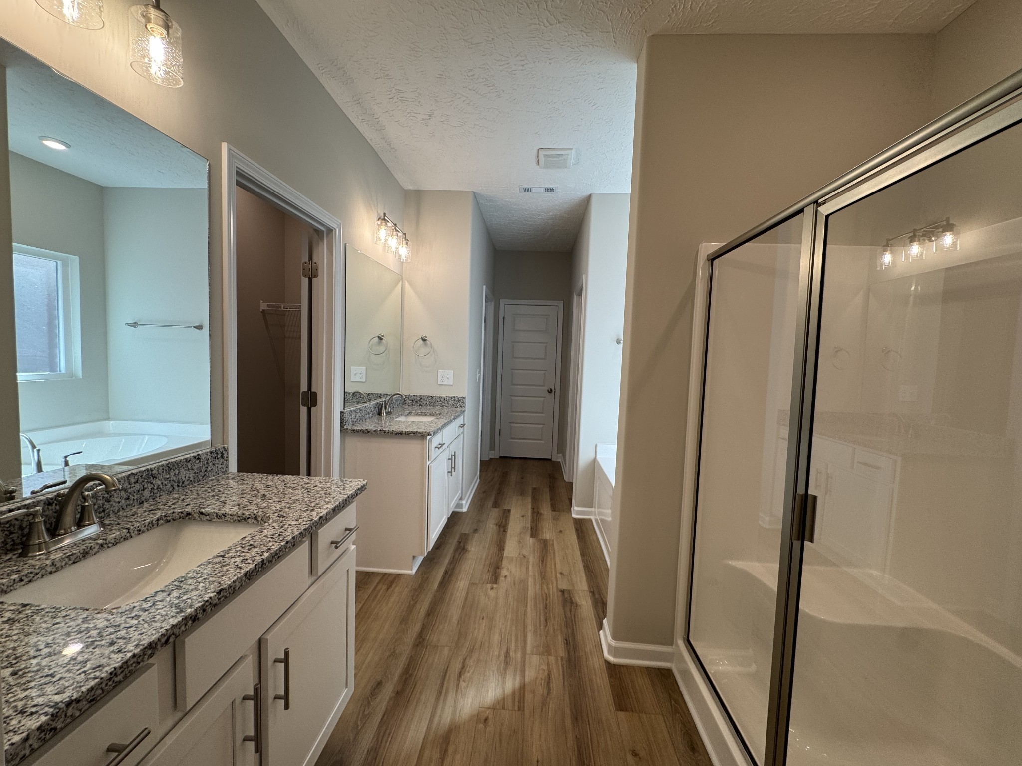 57 Laurel View Street Manchester, TN 37355 - Photo 11 of 23 a bathroom with a granite countertop sink shower and a mirror