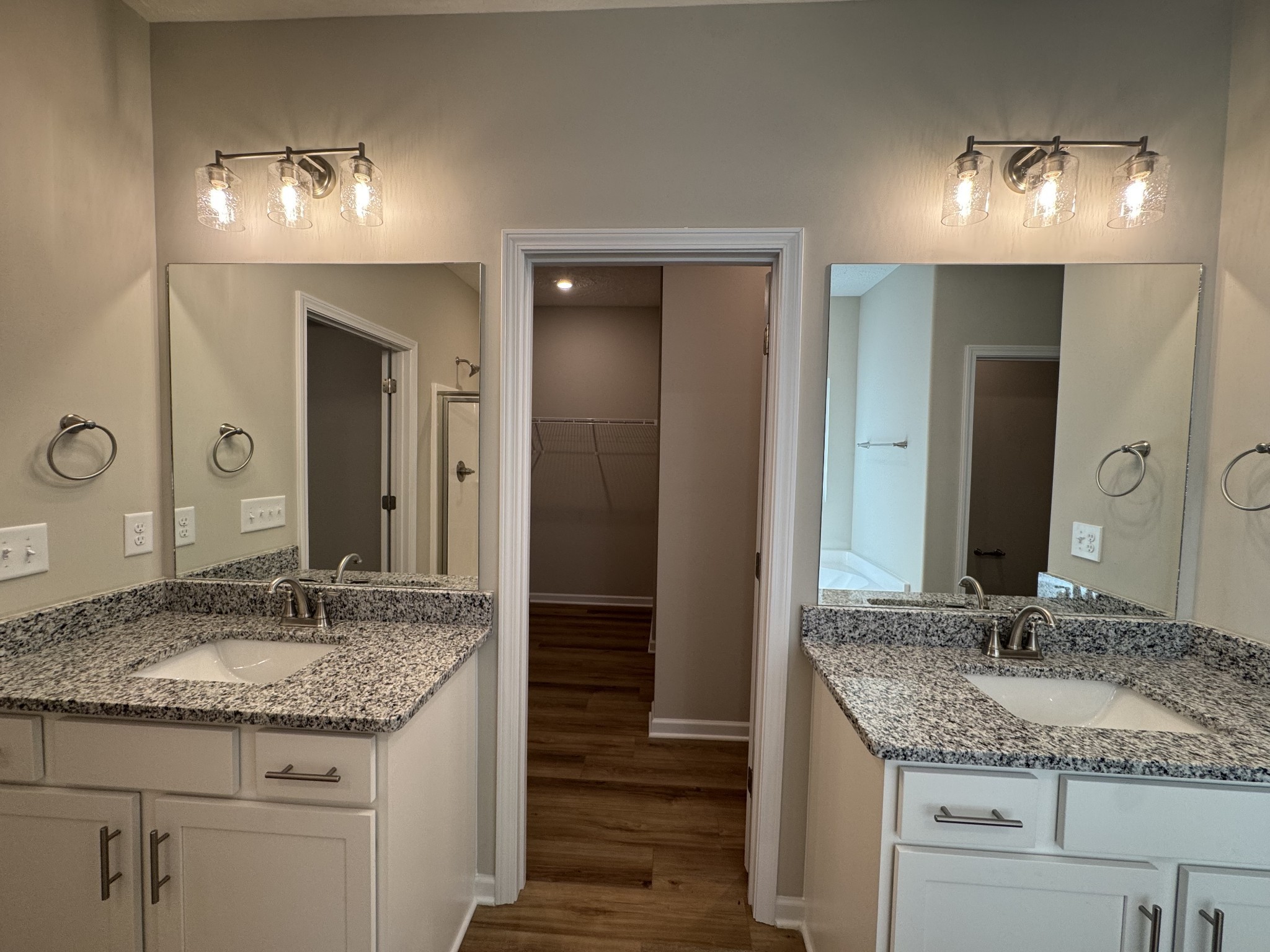 57 Laurel View Street Manchester, TN 37355 - Photo 12 of 23 a bathroom with a granite countertop sink and a mirror