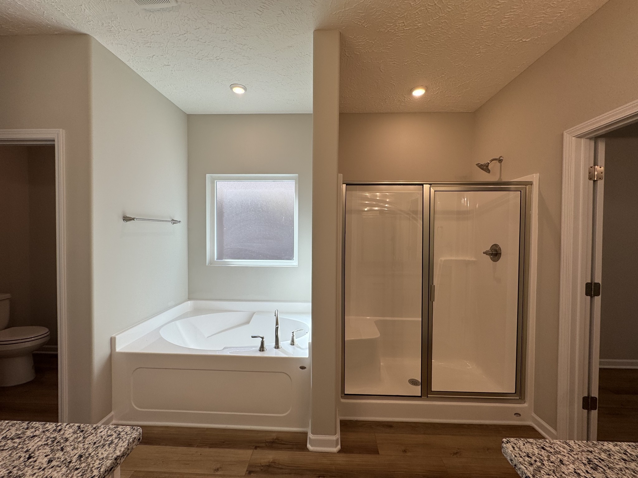 57 Laurel View Street Manchester, TN 37355 - Photo 13 of 23 a bathroom with a bathtub and a shower