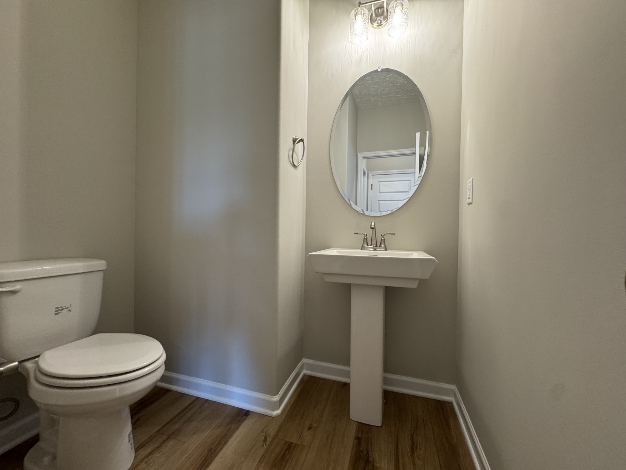 57 Laurel View Street Manchester, TN 37355 - Photo 15 of 23 a bathroom with a toilet a sink and a mirror