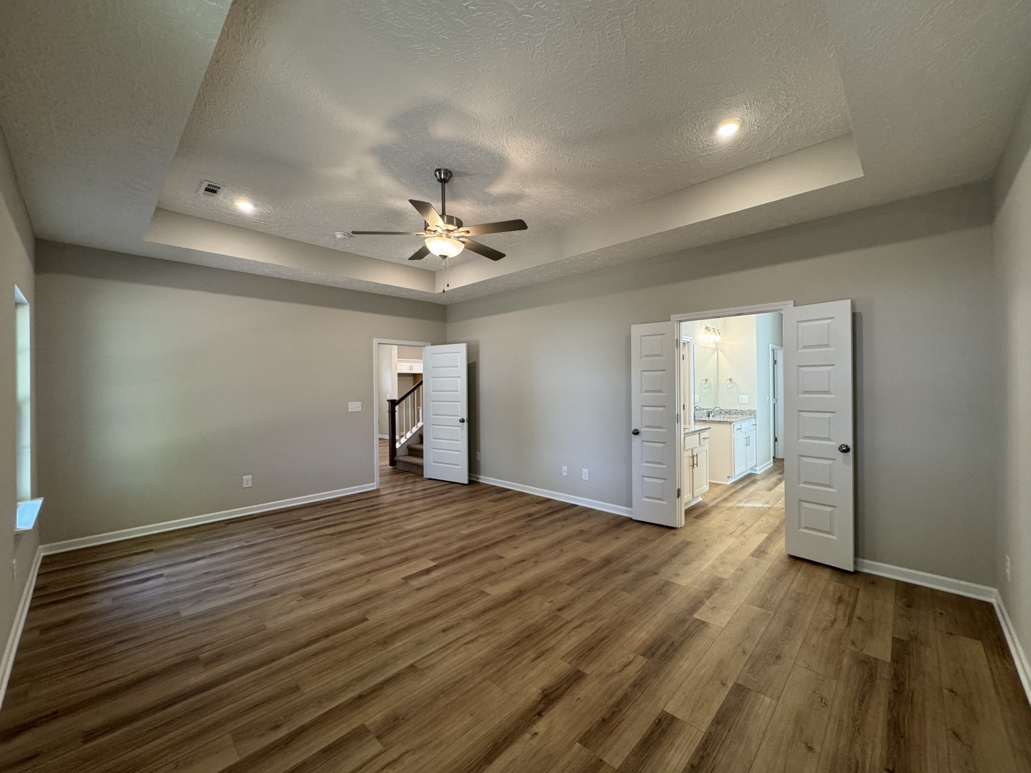 57 Laurel View Street Manchester, TN 37355 - Photo 10 of 23 a view of an empty room with glass door and wooden floor