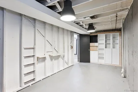 a view of entryway and hall with a front door