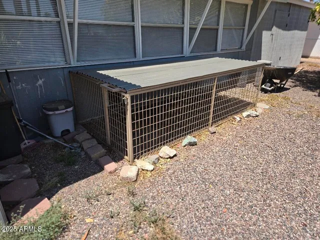 a view of a backyard with pathway