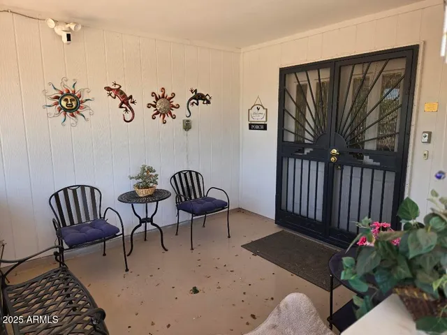 a view of a livingroom with furniture and wooden floor