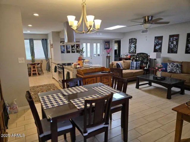 a view of a dining room with furniture