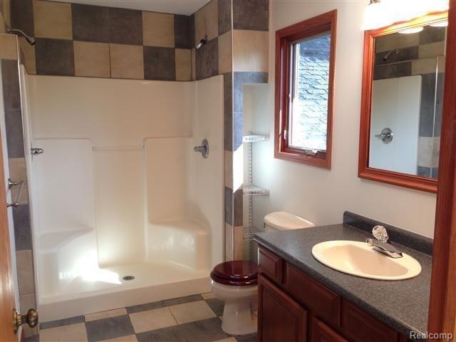 375 North Latson Road Howell, MI 48843 - Photo 11 of 25 Master bathroom