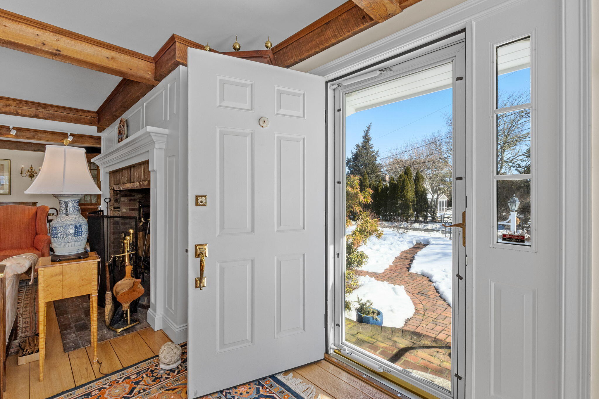 16 Old Salt Works Road Chatham, MA 02633 - Photo 18 of 69 a view of a porch with furniture and front door