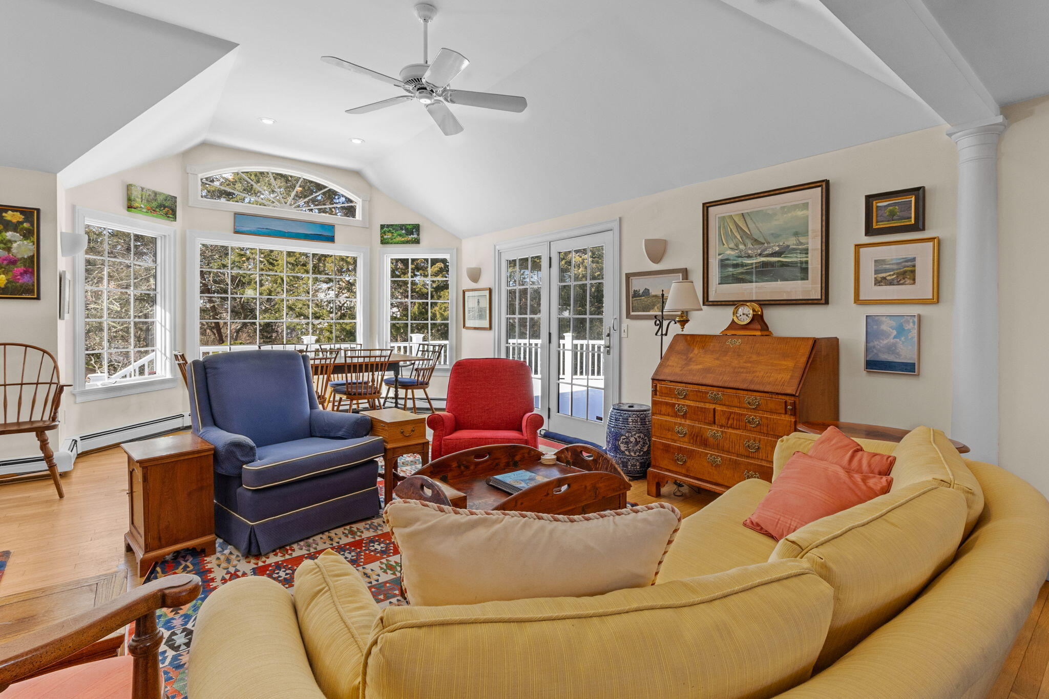 16 Old Salt Works Road Chatham, MA 02633 - Photo 29 of 69 a living room with furniture ceiling fan and a window