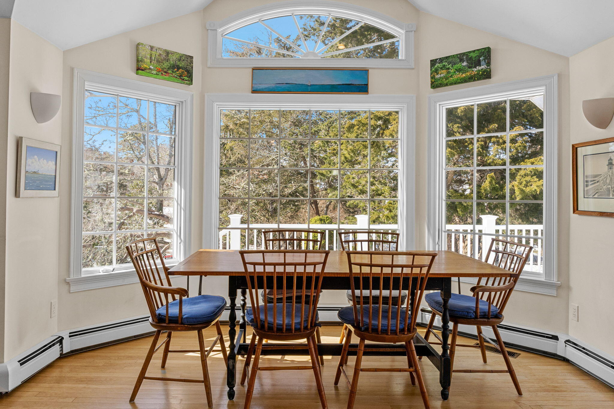 16 Old Salt Works Road Chatham, MA 02633 - Photo 30 of 69 a view of a dining room with furniture a rug and wooden floor