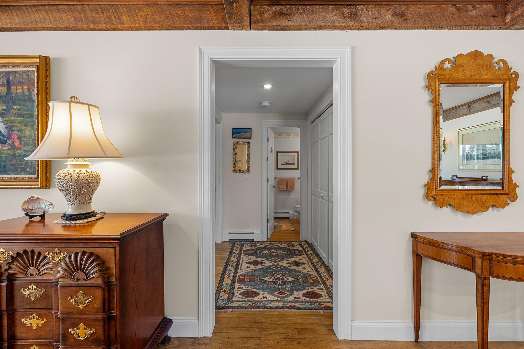 16 Old Salt Works Road Chatham, MA 02633 - Photo 35 of 69 a view of a hallway to a livingroom with furniture