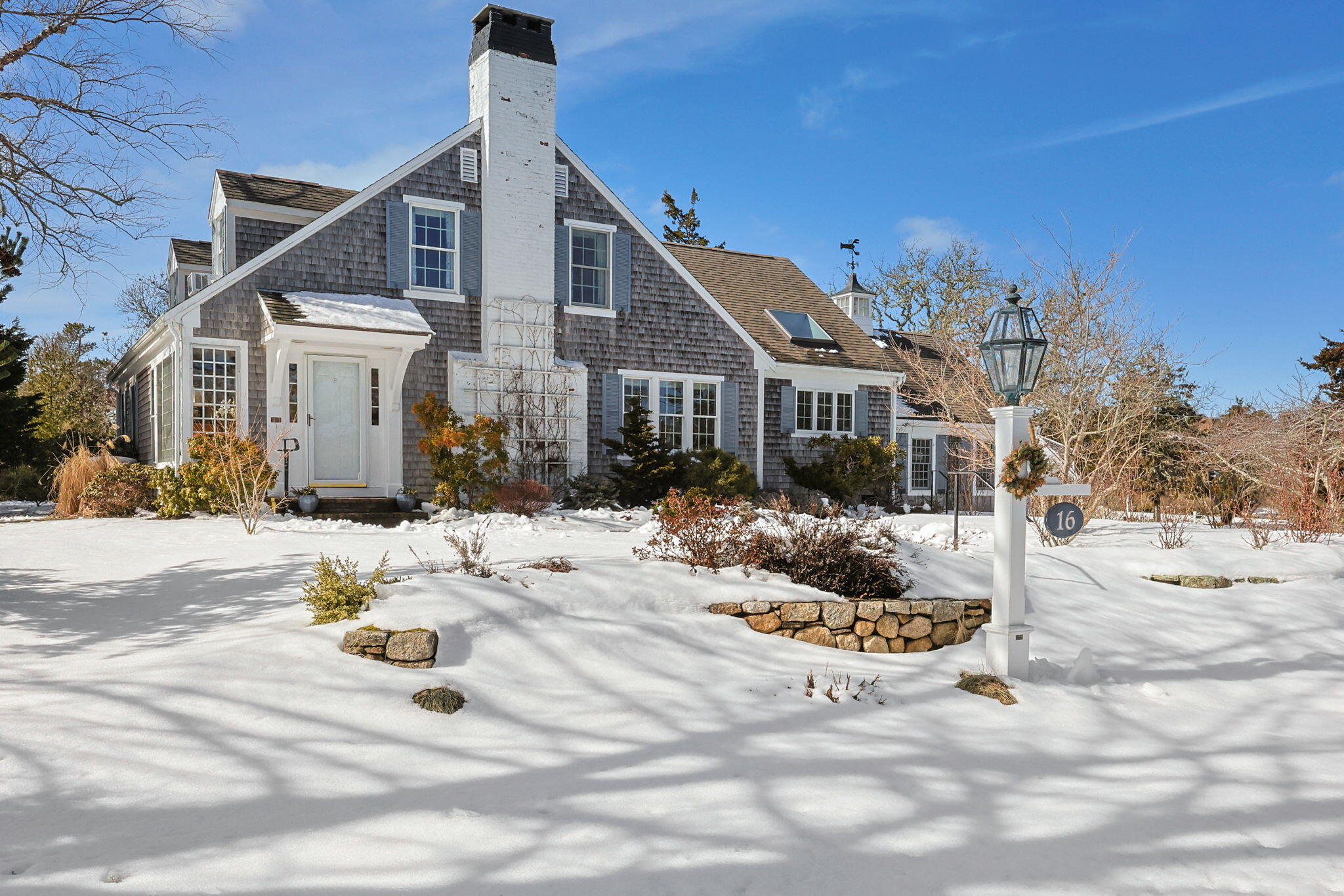 16 Old Salt Works Road Chatham, MA 02633 - Photo 57 of 69 a view of a house with snow on the background