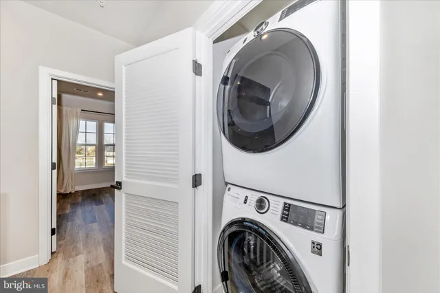 a bathroom with a sink a toilet and shower curtain