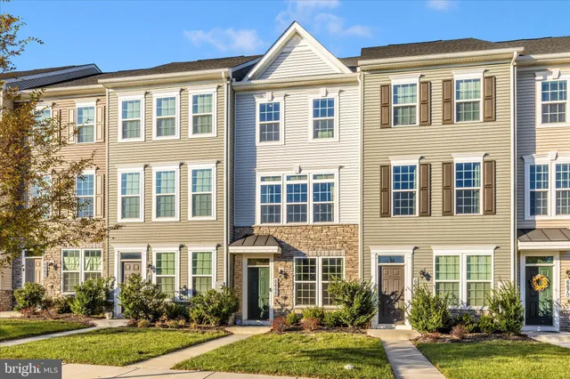 a view of a balcony with furniture