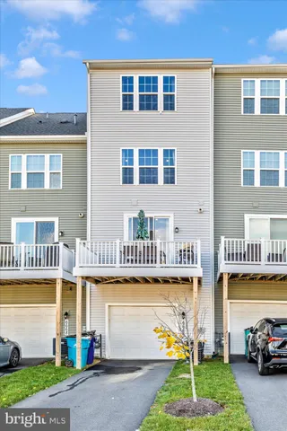 a view of houses with double vanity and swimming pool