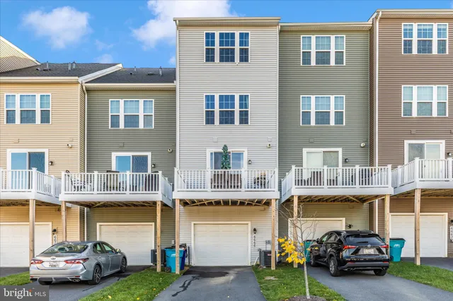 a view of a house with a big yard