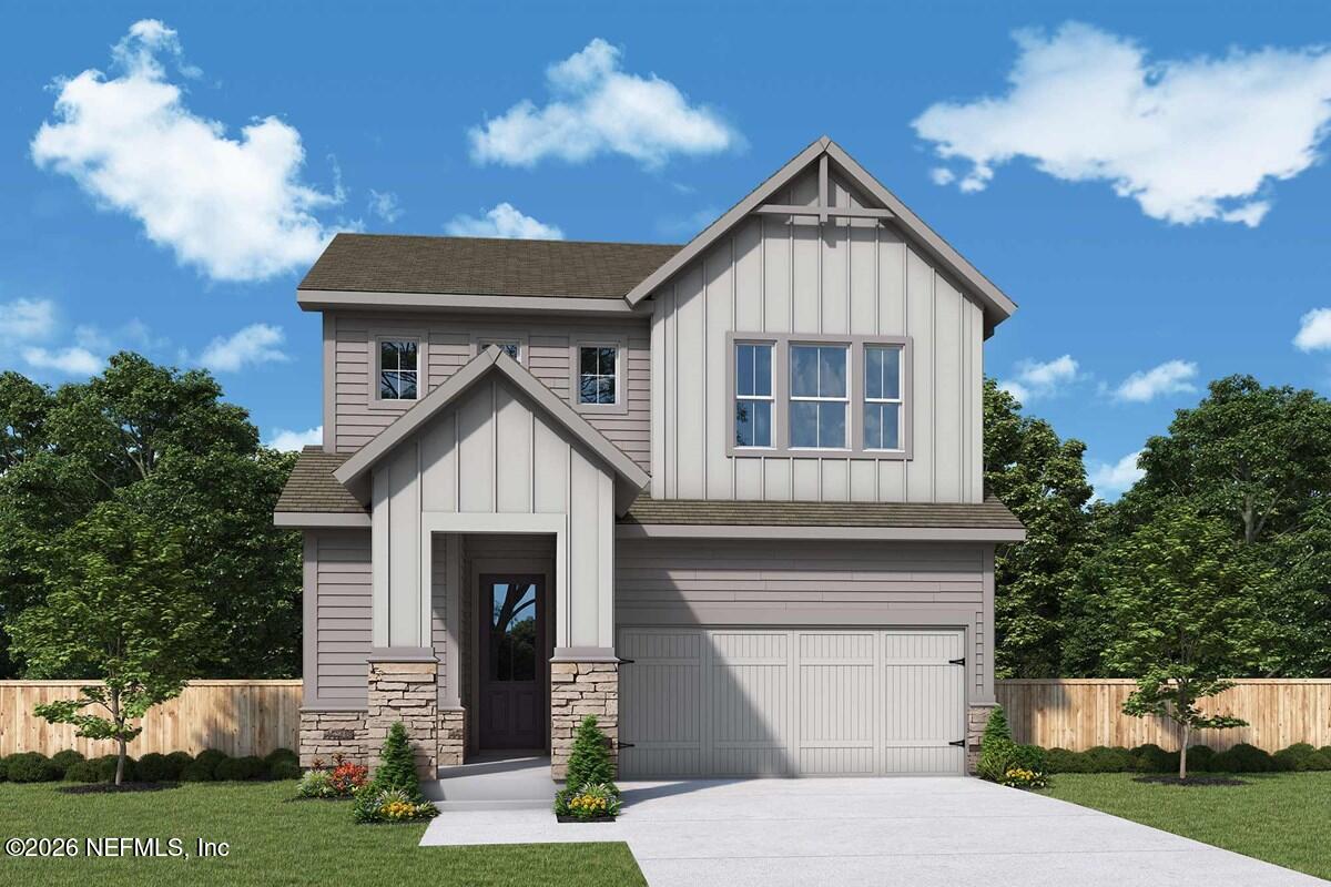 6016 Timber Pines Road Jacksonville, FL 32224 - Photo 1 of 3 a front view of a house with garden