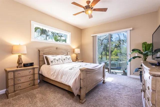 a view of a swimming pool and lounge chairs