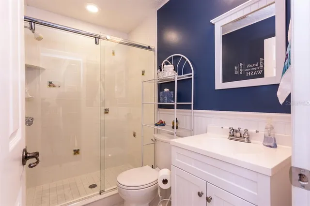 an aerial view of a house with a swimming pool yard and outdoor seating
