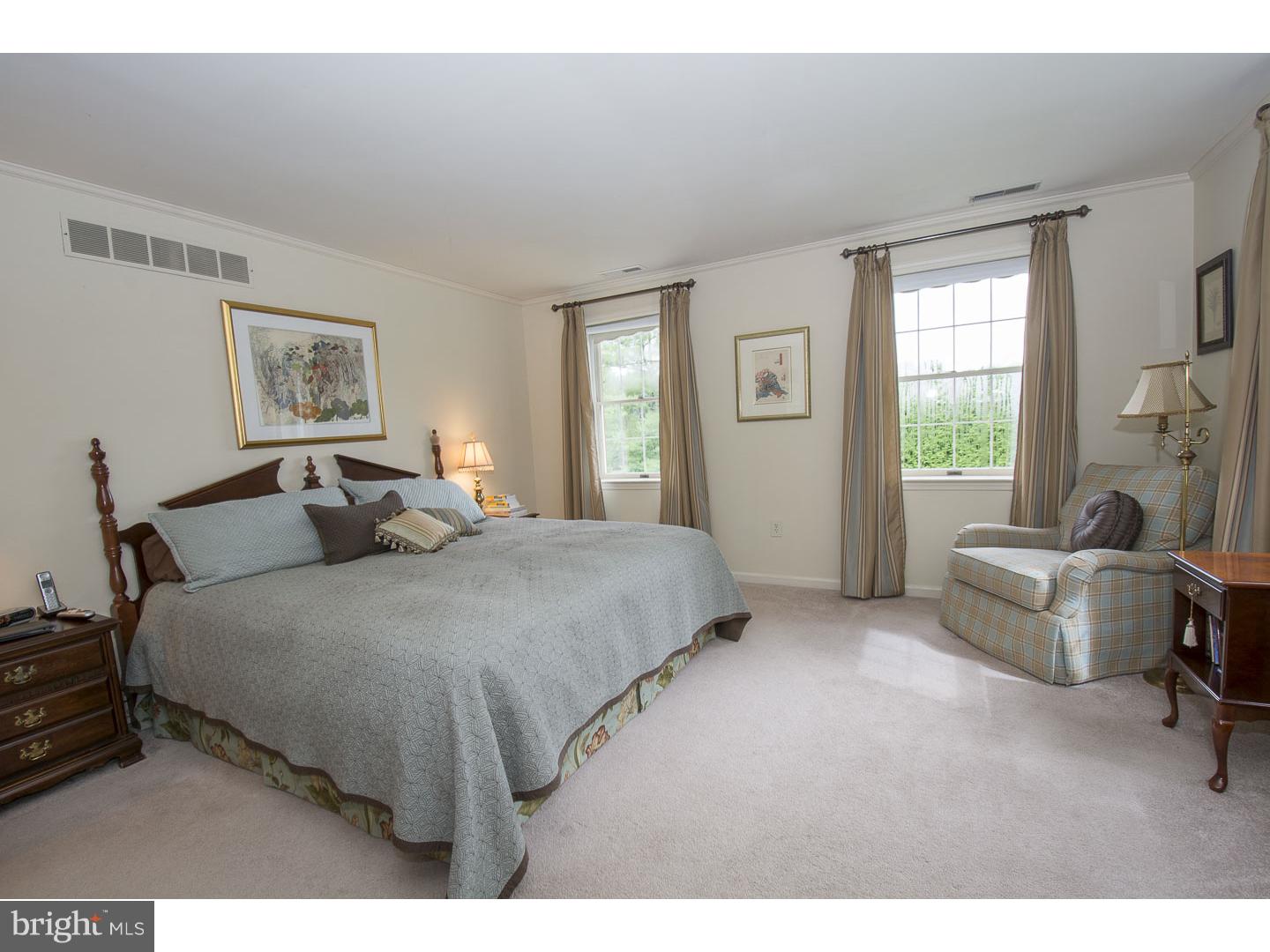 709 South Waterloo Road Devon, PA 19333 - Photo 11 of 25 a bedroom with a bed and a couch