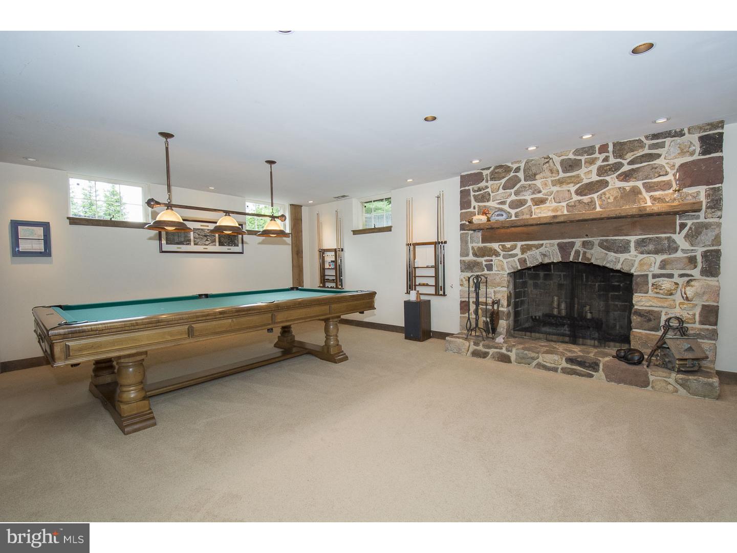 709 South Waterloo Road Devon, PA 19333 - Photo 17 of 25 a room with furniture and a fireplace