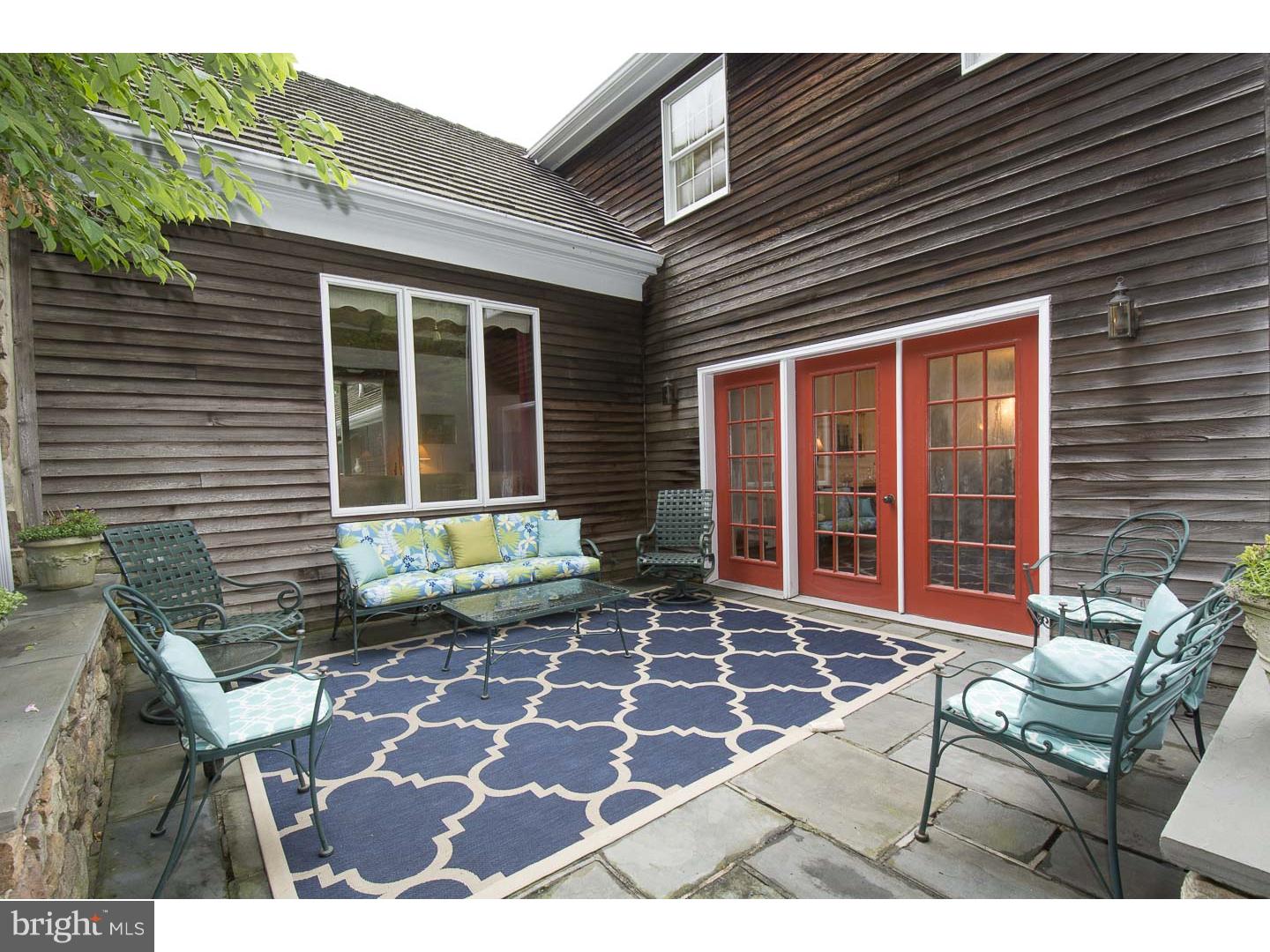 709 South Waterloo Road Devon, PA 19333 - Photo 20 of 25 a front view of a house with a patio