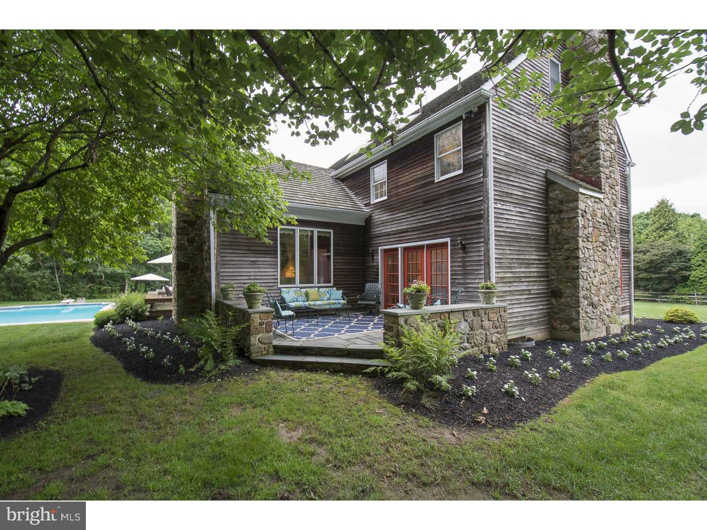 709 South Waterloo Road Devon, PA 19333 - Photo 21 of 25 a view of a house with backyard and sitting area