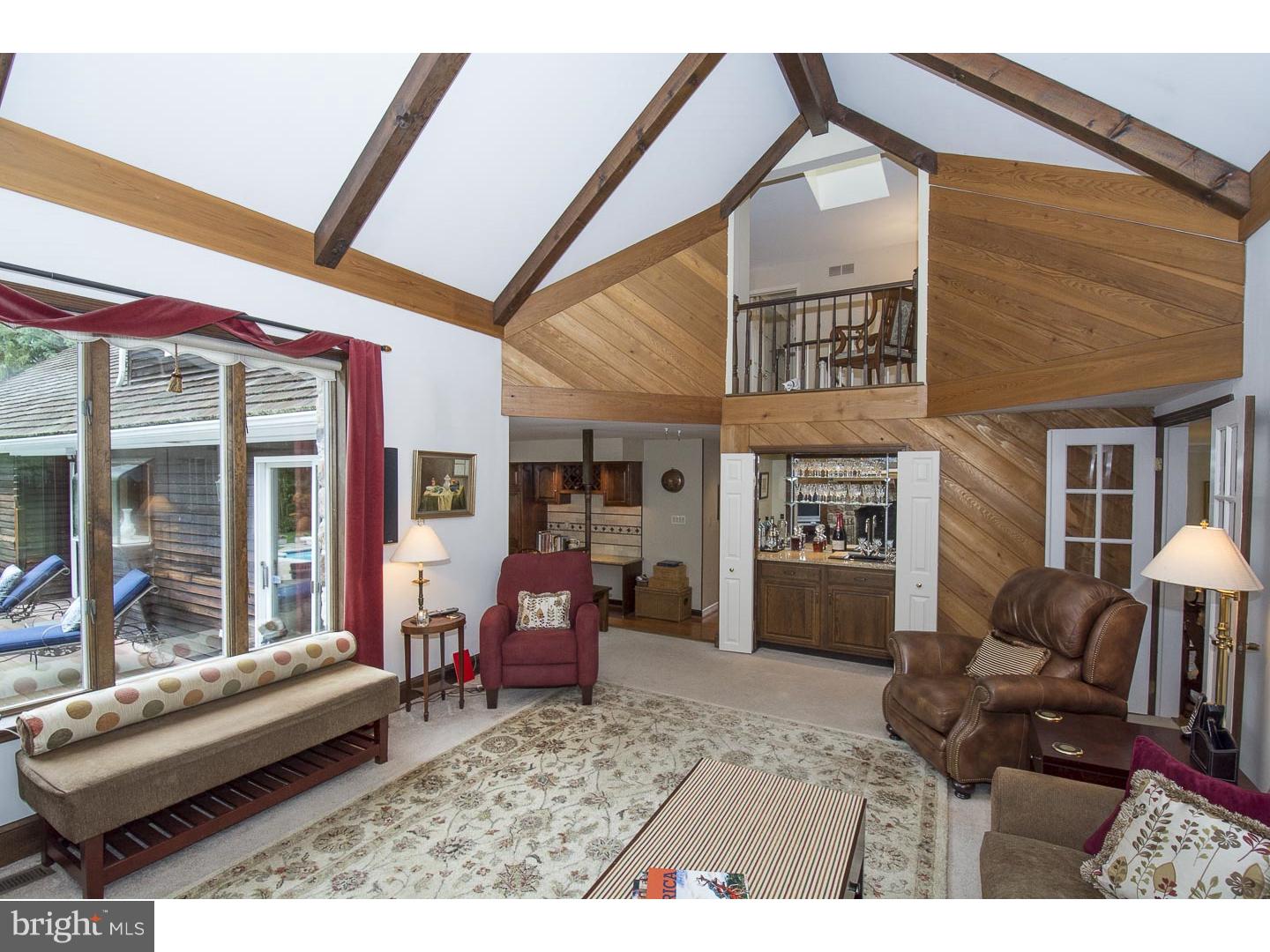 709 South Waterloo Road Devon, PA 19333 - Photo 6 of 25 a living room with furniture and a fireplace