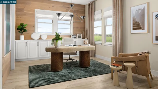 a dining room with table and chairs