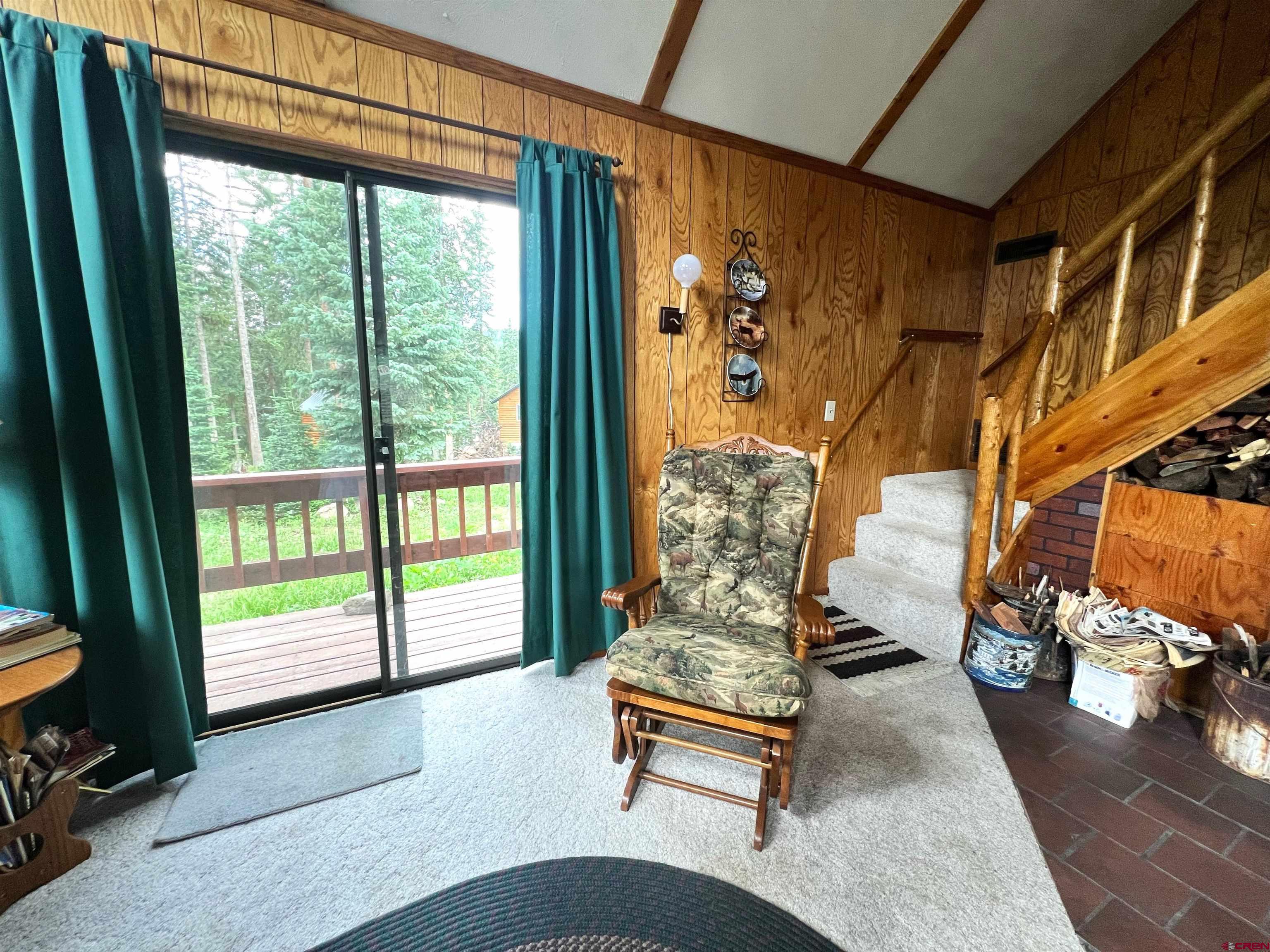 26711 High Drive Cedaredge, CO 81413 - Photo 6 of 9 a living room with furniture and a window