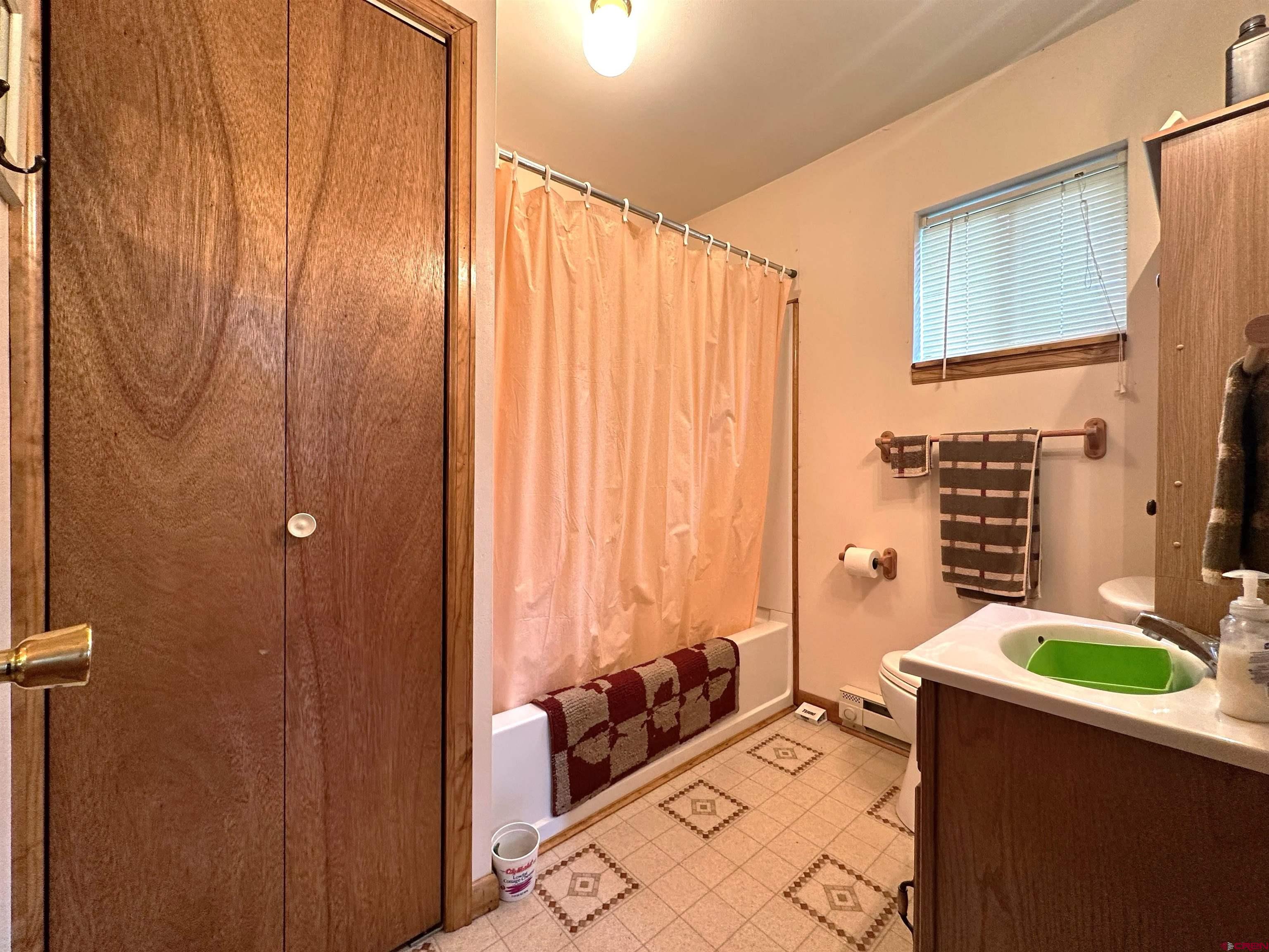 26711 High Drive Cedaredge, CO 81413 - Photo 8 of 9 a very nice looking room with a large window