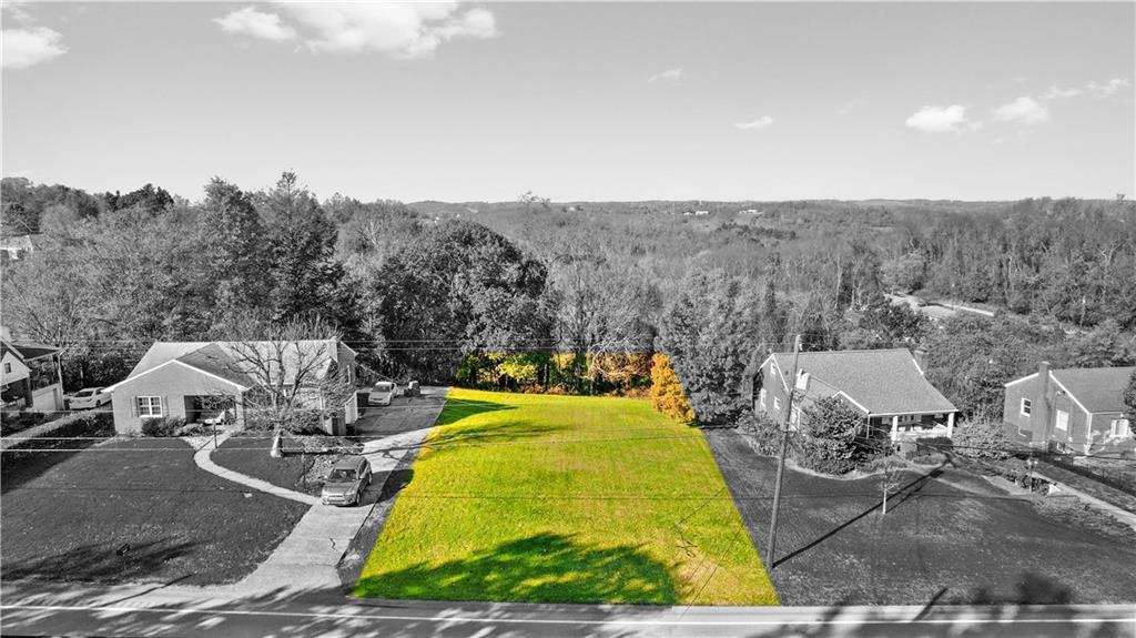 Lot Lot Country Club Road Monongahela, PA 15063 - Photo 9 of 14 a view of a swimming pool with outdoor seating and covered with green space