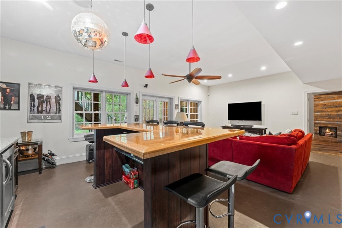 3308 Yarding Way Toano, VA 23168 - Photo 77 of 83 a dining room with a table and chairs