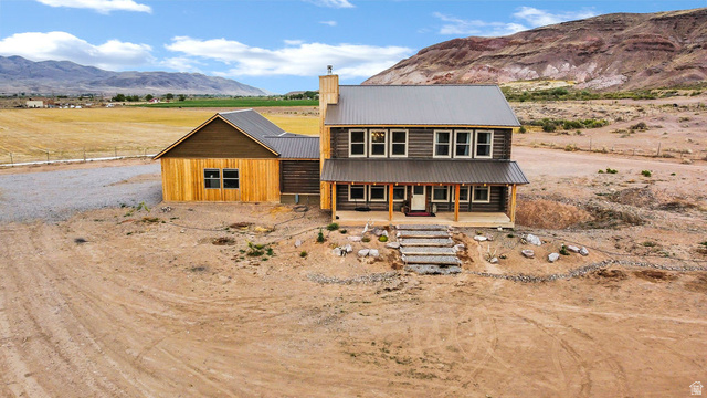 544 East 600 North, Unit 1 Joseph, UT 84739 - Photo 38 of 65 Rustic-style residence featuring a metal roof, wood siding, and an inviting covered porch