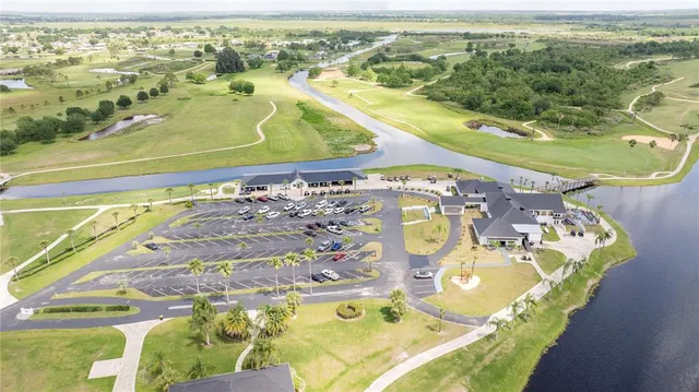 an aerial view of a house with swimming pool