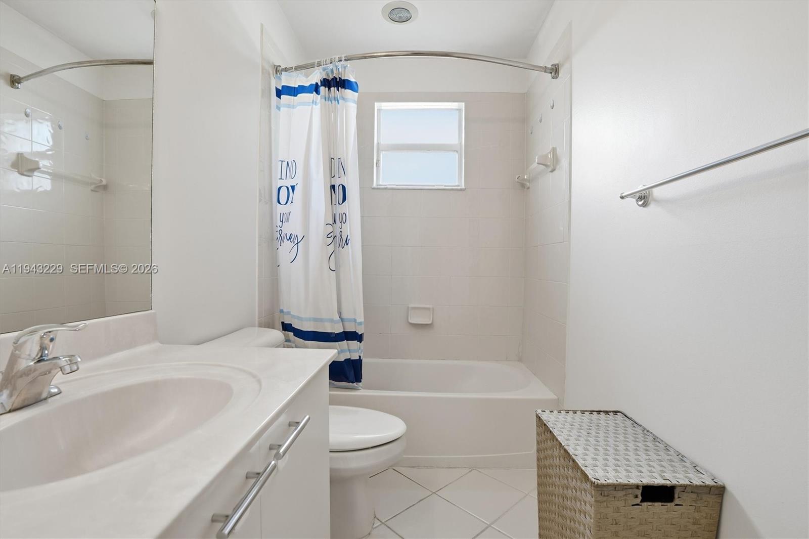 16367 Southwest 48th Street Miramar, FL 33027 - Photo 16 of 41 a bathroom with a sink a toilet and shower