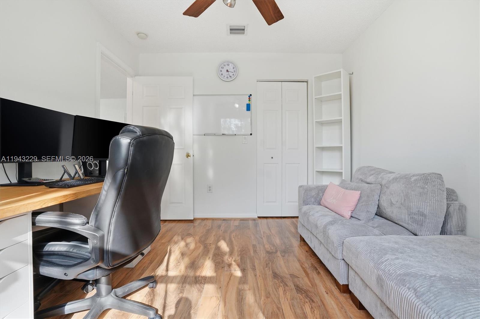 16367 Southwest 48th Street Miramar, FL 33027 - Photo 18 of 41 a living room with furniture and a flat screen tv