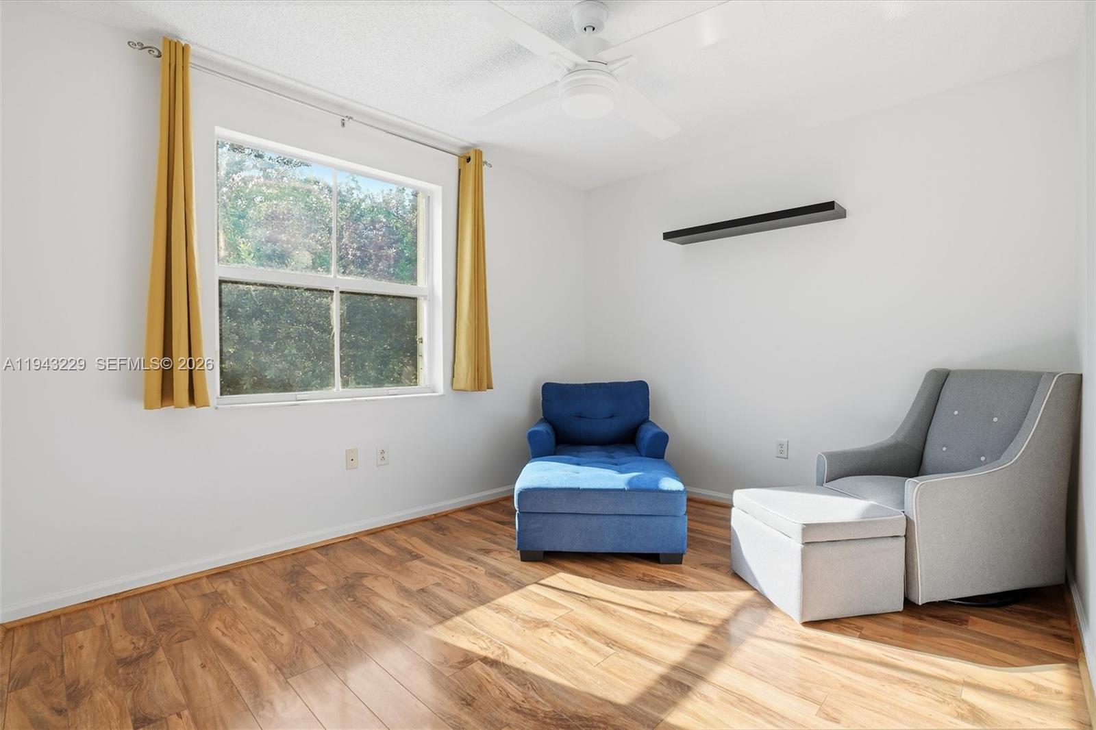 16367 Southwest 48th Street Miramar, FL 33027 - Photo 20 of 41 a bedroom with furniture and window